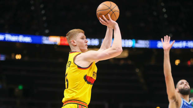 Dec 5, 2021; Atlanta, Georgia, USA; Atlanta Hawks guard Kevin Huerter (3) shoots the ball against the Charlotte Hornets in the second half at State Farm Arena.